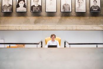 Person Sitting on Yellow Chair