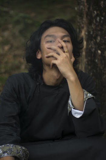 Person Sitting Outdoors