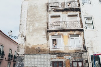 Person Standing in Front of Opened Window