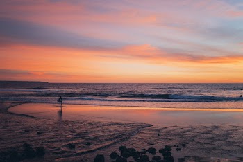 Person Standing in the Beach