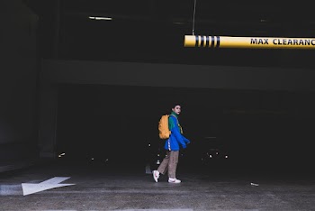 Person Standing Inside Parking Area