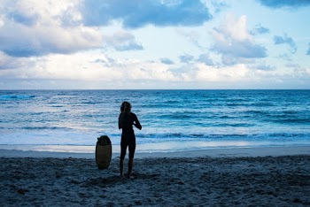 Person Standing Near Seashore
