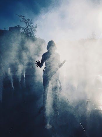 person Standing Near Smoke