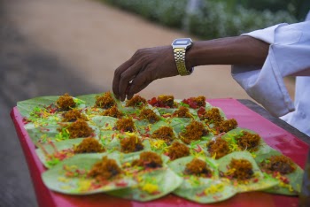 Person Standing Near Table With Cook Foods