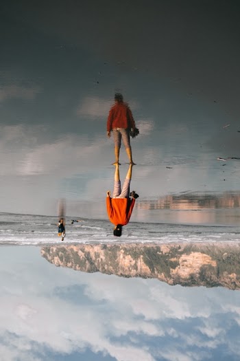 Person Standing on Body of Water Image during Day