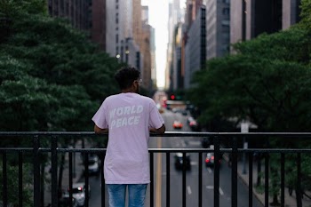 Person Standing On Bridge