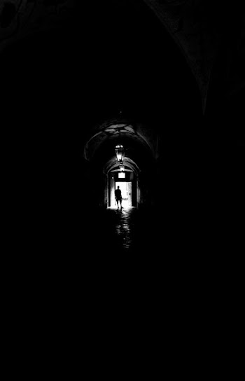 Person Standing on Hallway