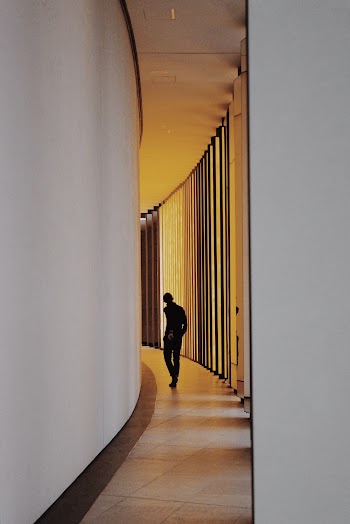 Person Standing on Hallway
