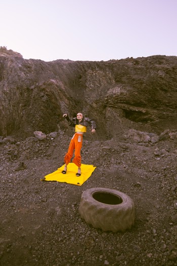 Person Standing on Mountain