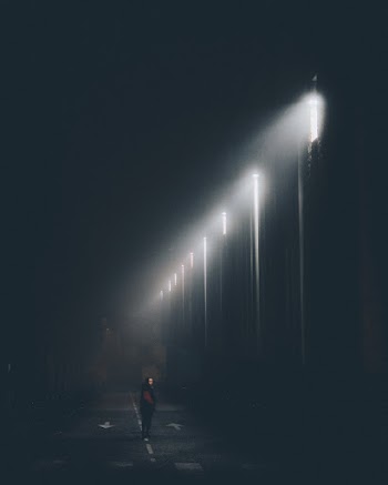 Person Standing on Road
