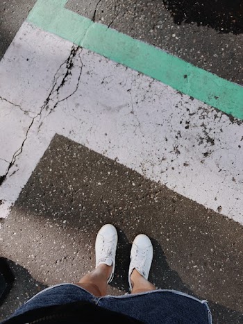 Person Standing on Road