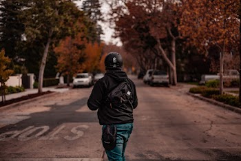Person Standing on Road