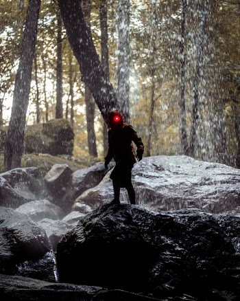 person standing on rock during daytime