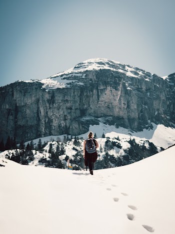 Person Standing On Snow
