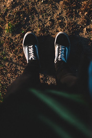 Person Standing on Soil Ground