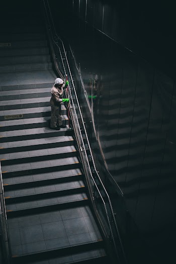 Person Standing on Stairs