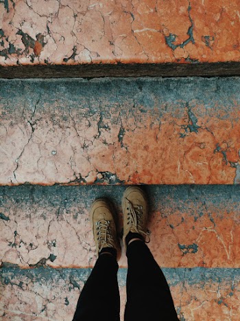 Person Standing on Steps