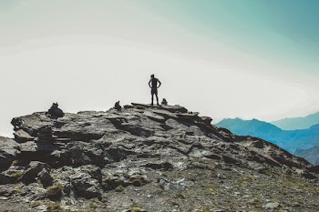 Person Standing on the Cliff