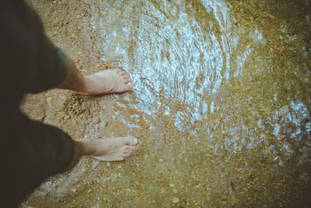 Person Standing on Water