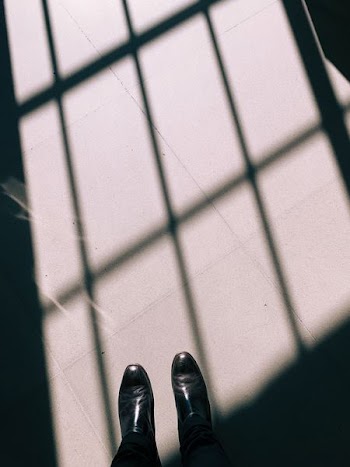 person standing on white surface at daytime