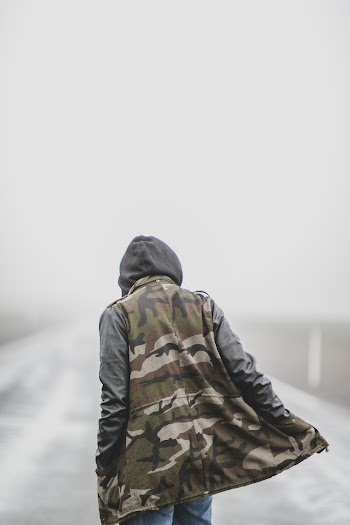 Person Standing Outdoors