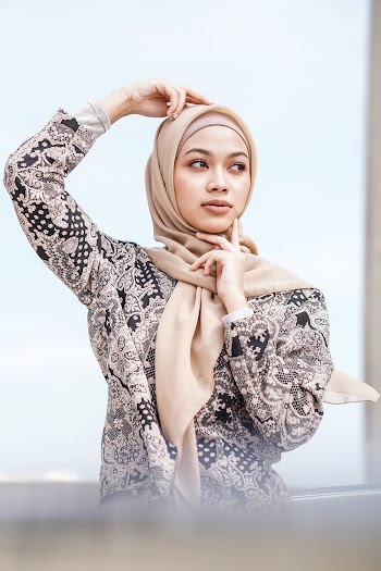Person Standing Outdoors Wearing Hijab