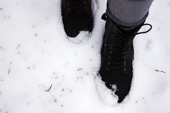 Person Stepping On Snow