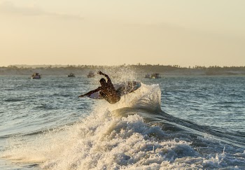 Person Surfboarding