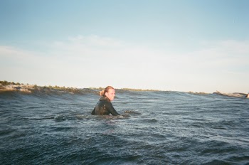 Person Swimming in a Body of Water