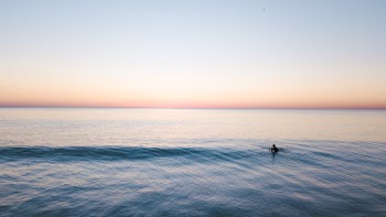 Person Swimming In The Sea