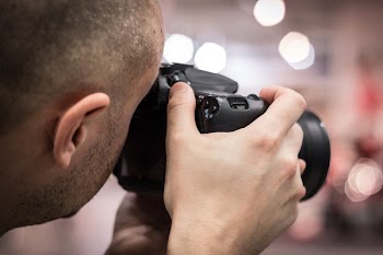 Person Taking a Photo