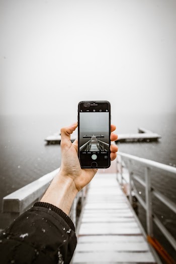 Person Taking a Photo of Dock
