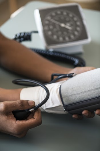 Person Taking Blood Pressure 