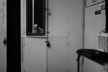 Person Taking Photo in Front of Mirror Inside Room