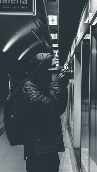 Person Taking Photo Inside Station