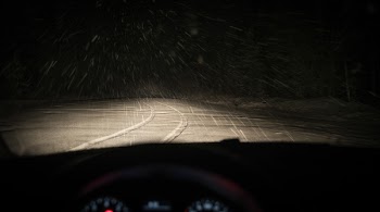 Person Taking Photo of Road Covered With Snow