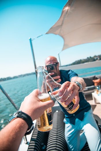 Person Taking Photo While Having A Toast