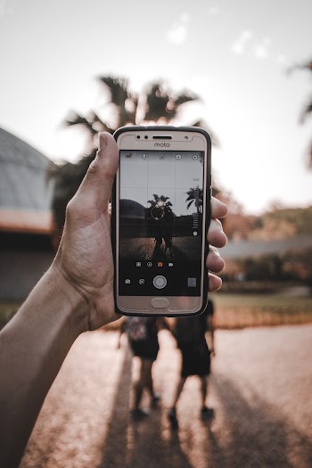 Person Taking Picture Using a Smartphone
