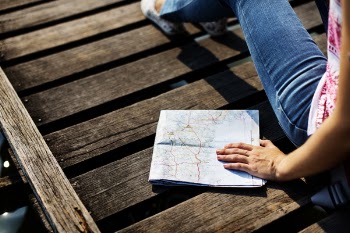 Person Touching Map