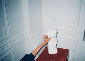Person Touching Sculpture