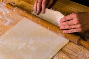 Person Using A Rolling Pin