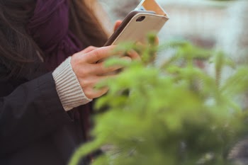 Person Using Black Android Smartphone