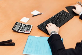 Person Using Black Computer Keyboard