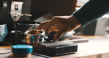 Person Using Espresso Machine