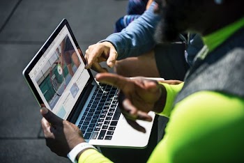 person using gray laptop computer