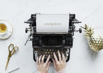 Person Using Inspire Typewriter