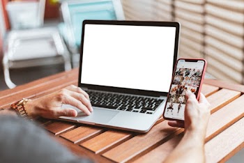 Person Using Macbook and Iphone X