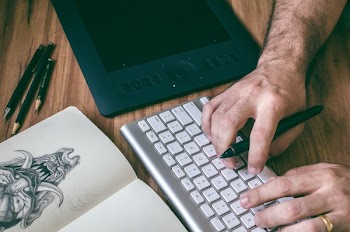 Person Using Magic Keyboard