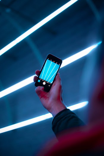 Person Using Smartphone's Camera
