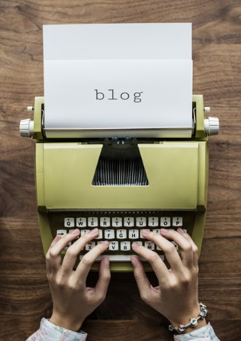 Person Using Typewriter
